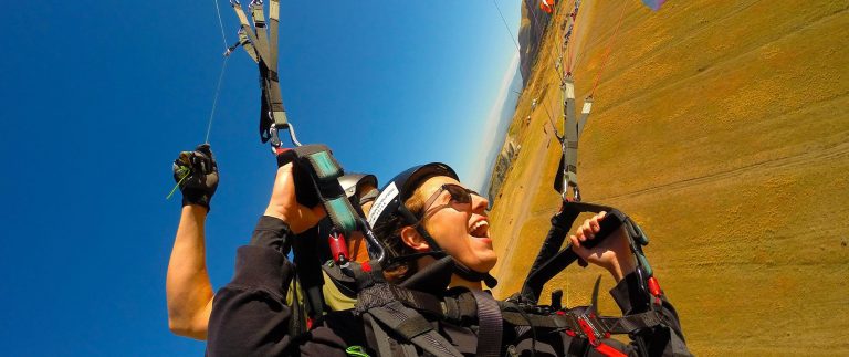 How many meters is the paragliding at least?